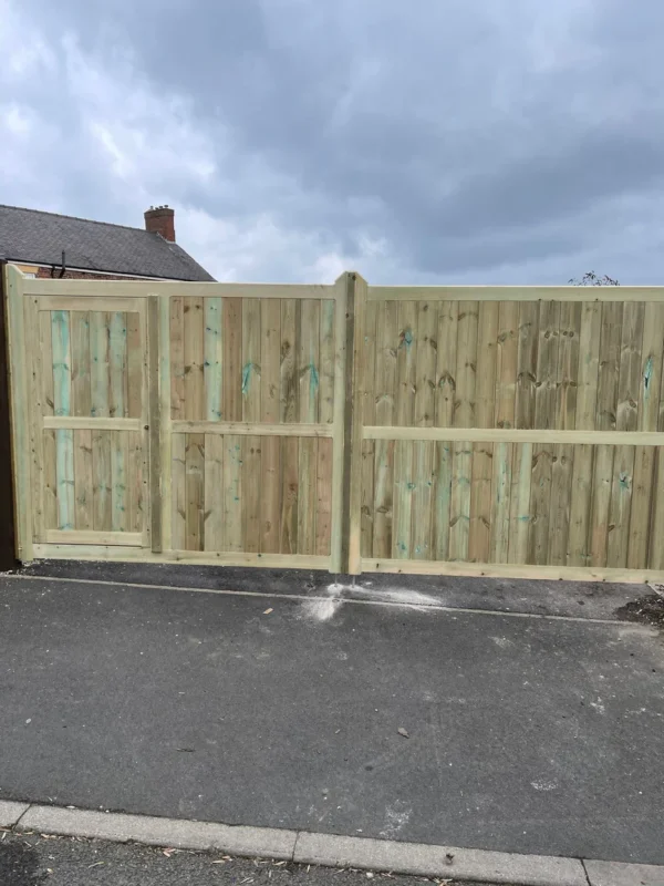 Lodge style with pedestrian access door - Irko Hardwood