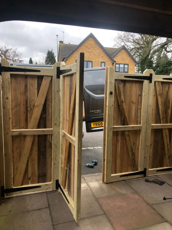 Bi-folding solid boarded style - Pressure Treated Tanalised Timber - Image 2